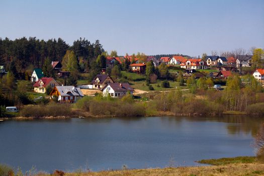 Landscape over the lake and village
