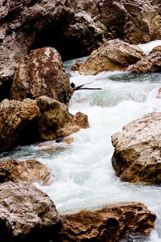 A white stream and a rocks
