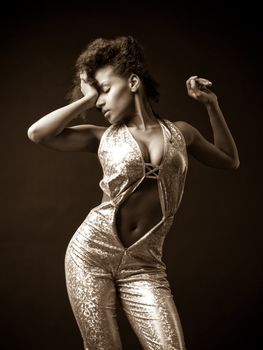 Sexy african gogo dancer posing, sepia