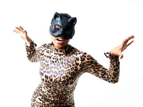 Dancer dressed in a leopard suit and cat mask; attacking and aggressive