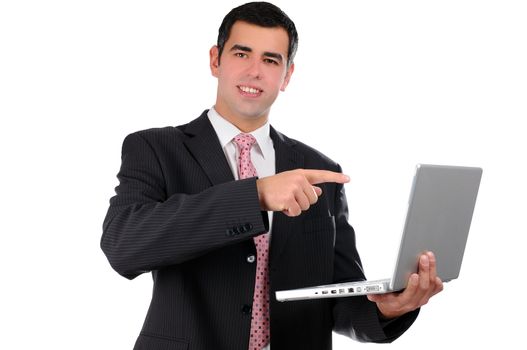 Close up of young businessman holding laptop poining finger on it