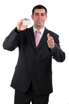 A cheerful businessman in a dark suit pointing forward with a business card in right hand
