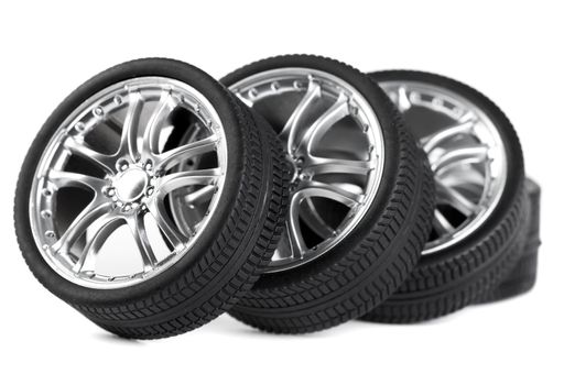 Car wheels on white background.