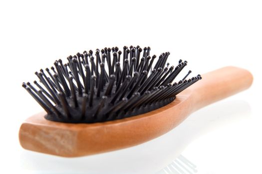 a hairbrush on a white background