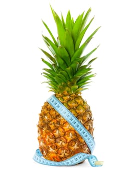 Pineapple with a measuring tape around