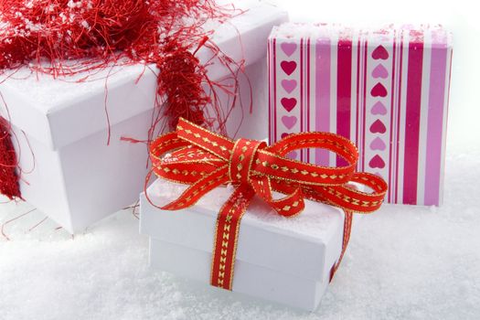 three presents with bows and ribbons