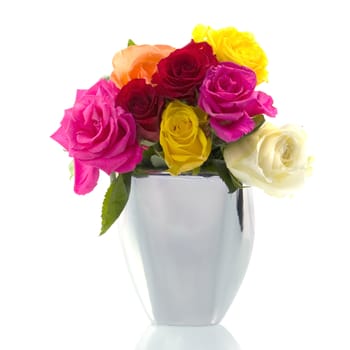 a white vase with colorful roses