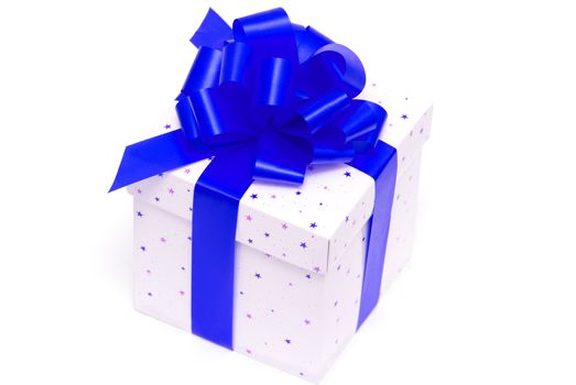 White gift box with blue ribbon isolated on white