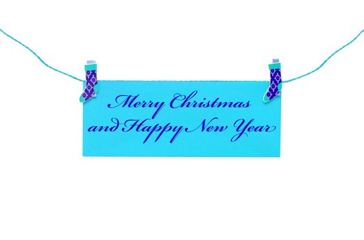 Christmas greeting card hanging with clothespin