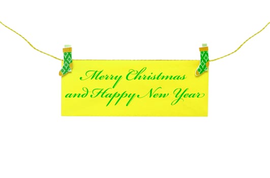 Christmas greeting card hanging with clothespin