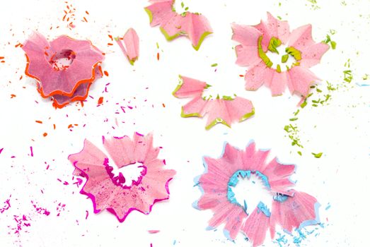 Colored pencil shavings isolated on wwhite