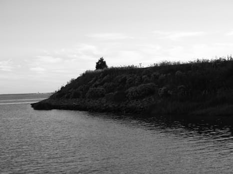 The north carolina sea shore in black and white