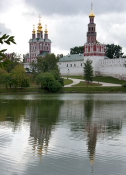 Focus on New Maiden convent reflecting in the lake.