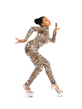 African dancer in leopard suit striking a dance pose