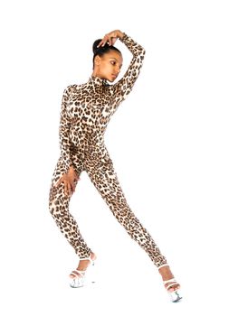 African dancer in leopard suit striking a dance pose