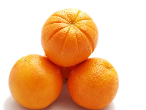 Orange fruits isolated towards white background