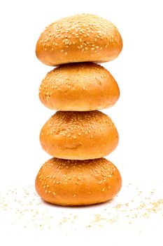 Column of buns with sesame isolated on the white background