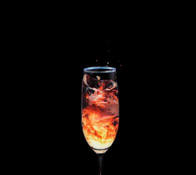 A drink that's appears to be like a fire, splashing