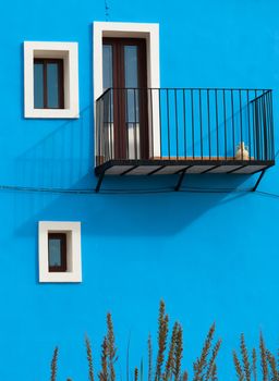 Mediterranean house façade, traditional architecture in deep blue