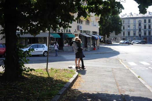 Couple kissing on Oslo street. Norway