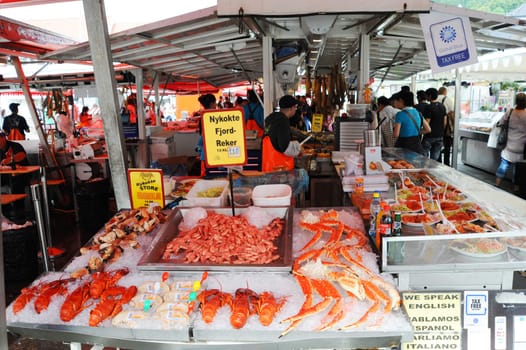 seller at a fish market in Bergen. Norway