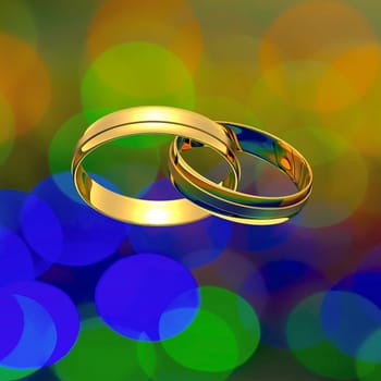 Interlocked golden rings on the blurry background