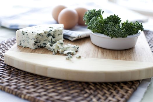 Blue cheese, raw broccoli and eggs:  quiche ingredients