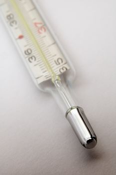 clinical thermometer on white background, distance blur