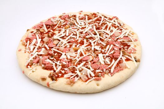 pizza ready for cooking, ham, champions and cheese