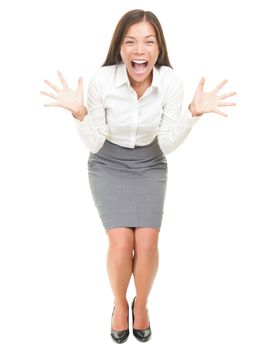 Crazy excited businesswoman screaming. Full length portrait of mixed race Asian / Caucasian female model isolated on white background.
