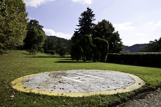 Private helicopter platform of small size in a private garden.