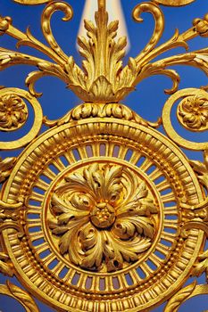 Detail of golden fence of Versailles Palace. France
