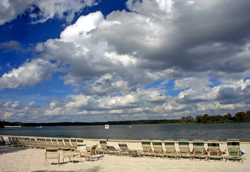 Beach with 3D like sky and looking over a lake.