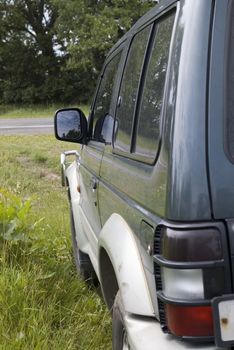 A car get stick in wood.