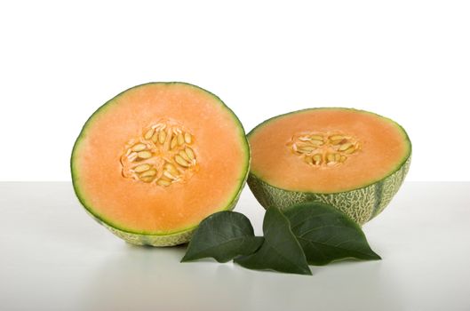 Picture of a cantaloupe over a white table