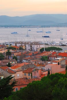 View on St. Tropez harbor in French Riviera at sunset