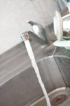 Water flowing from the kitchen tap
