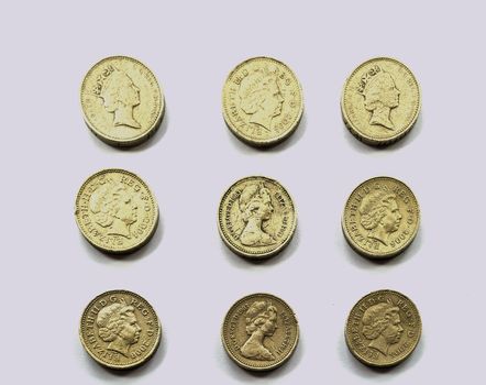 Nine pound coins arranged in grid