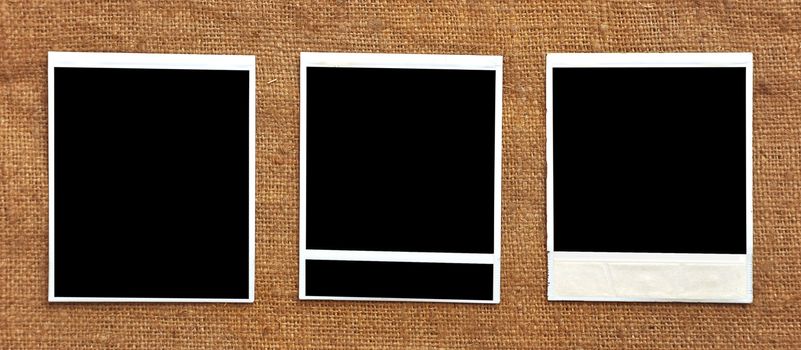 three frames attached against a textile background