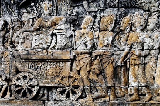 Buddhist bas-relief detail whit charriot in borobudur temple site