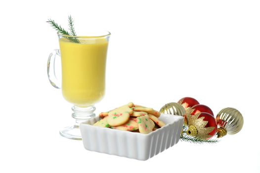 Fresh baked Christmas cookies served with egg nog.