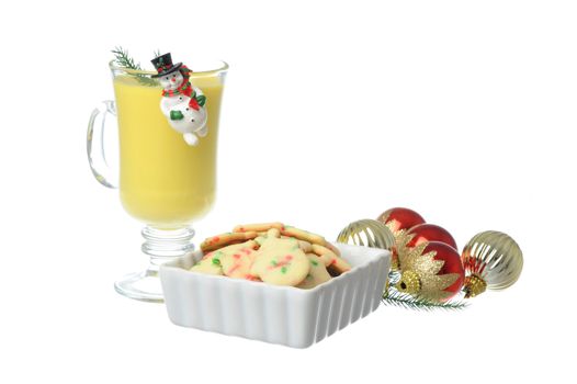 Fresh baked Christmas cookies served with egg nog.