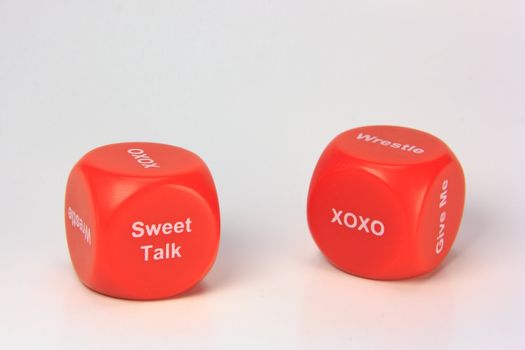 red cubes with chances to win love expression. on white