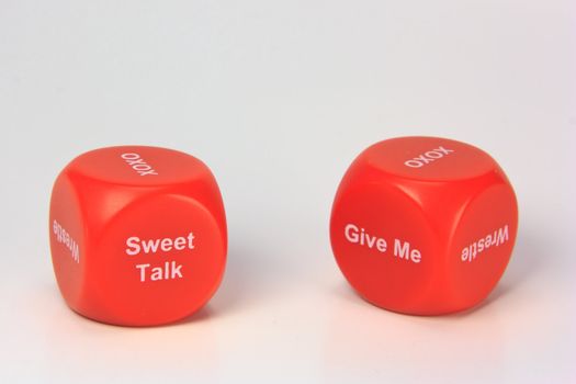 red cubes with chances to win love expression. on white