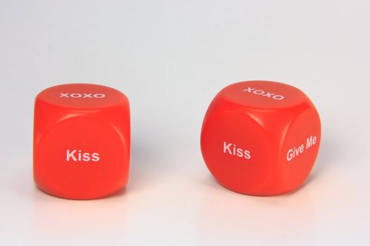red cubes with chances to win love expression. on white