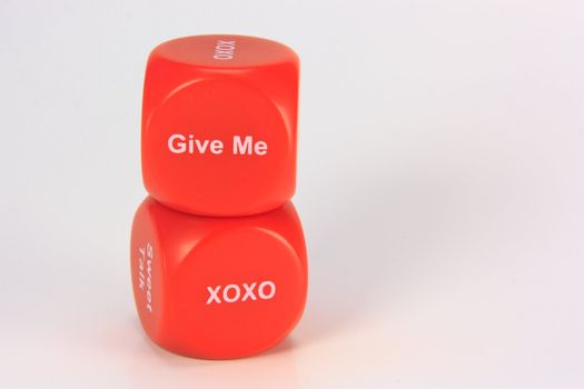 red cubes with chances to win love expression. on white