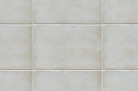 Ivory color tiles texture that perfectly loop horizontally and vertically
