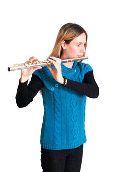 Young woman playing transverse flute isolated on white background.