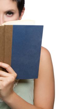 Beautiful young woman reading book