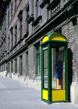 Urban street detail phone booth.